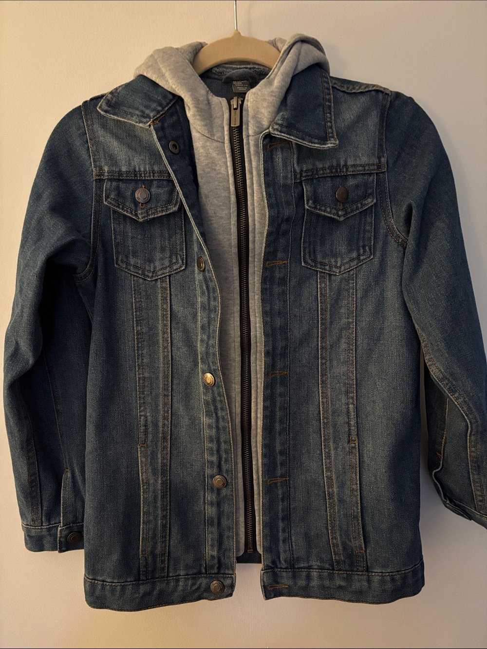 Jean jacket with faux hoodie insert. Perfect fall street wear staple.